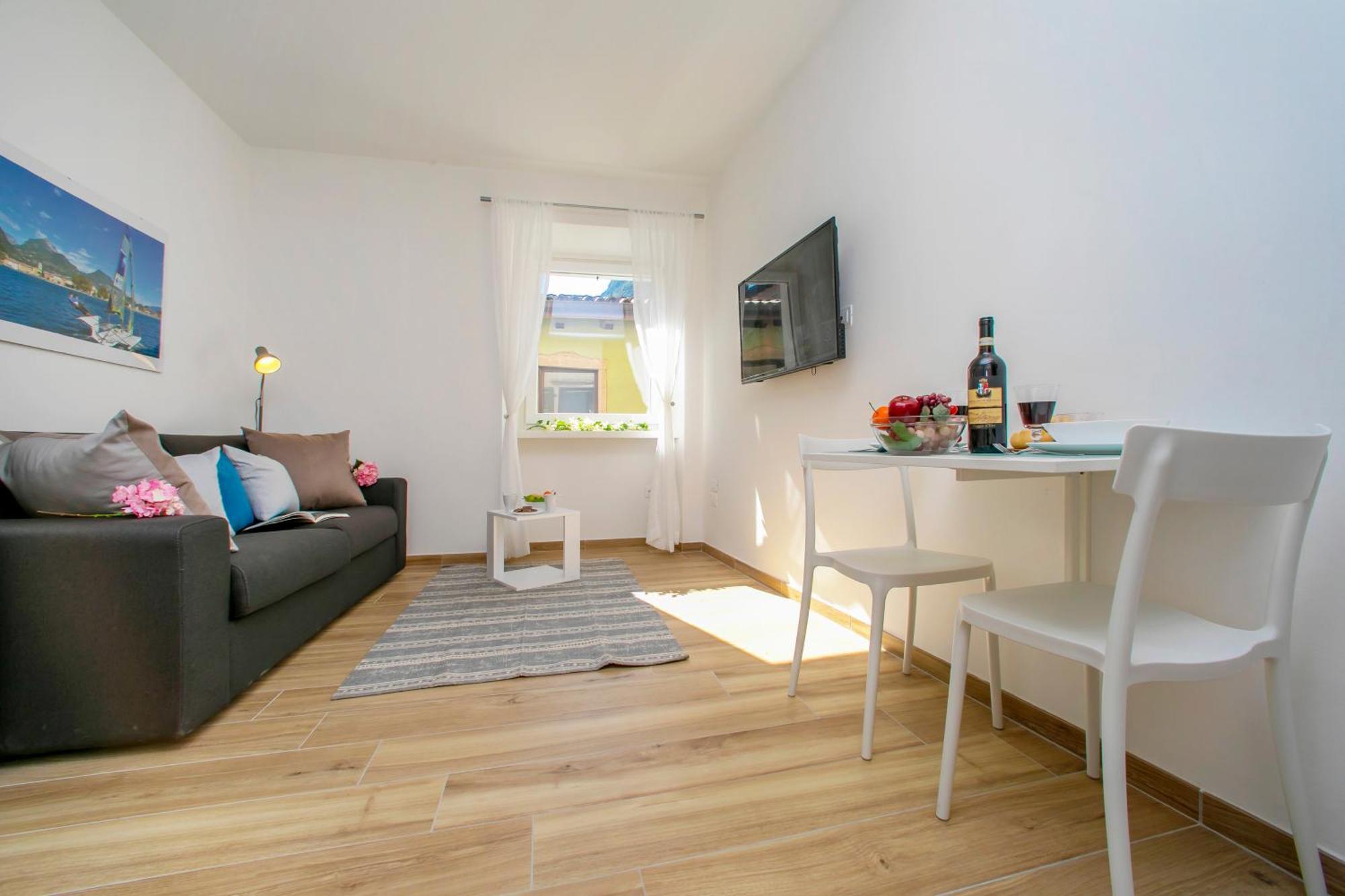 Nido Sui Tetti Di Riva Del Garda - Happy Rentals Eksteriør bilde