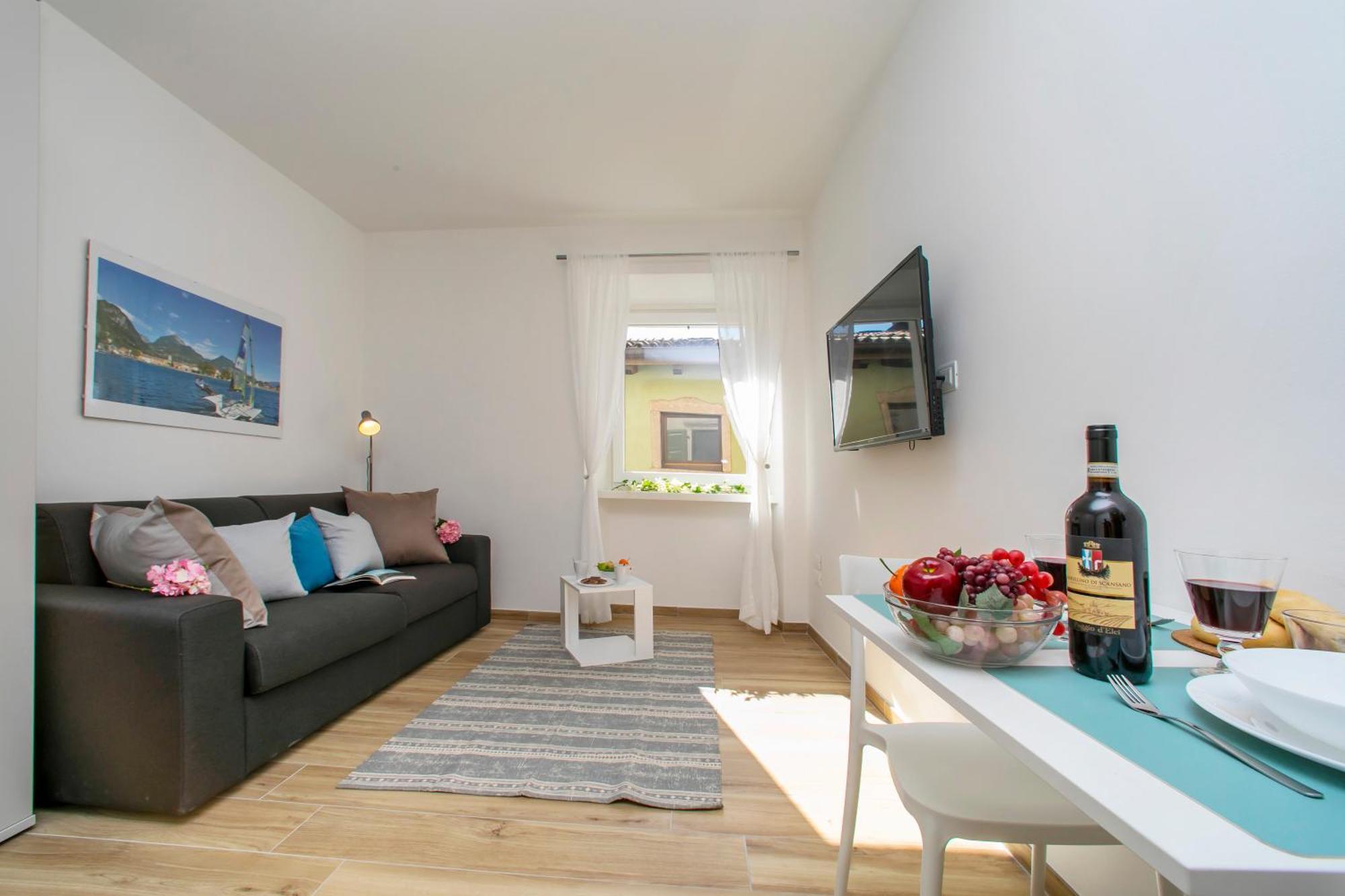 Nido Sui Tetti Di Riva Del Garda - Happy Rentals Eksteriør bilde