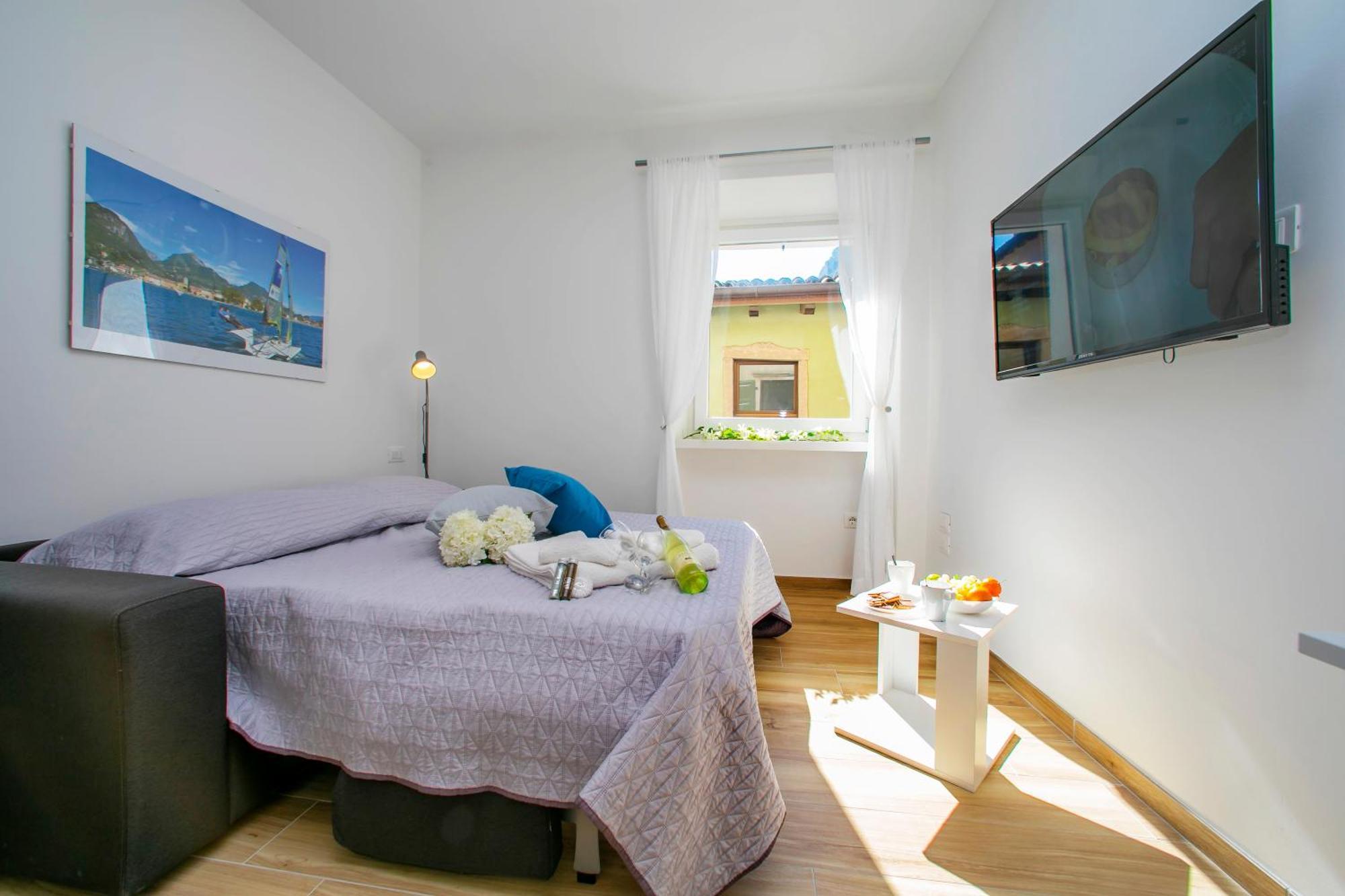 Nido Sui Tetti Di Riva Del Garda - Happy Rentals Eksteriør bilde